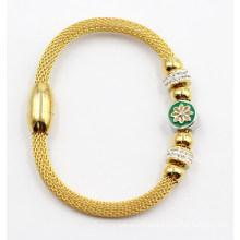 Brazalete de acero inoxidable chapado en oro con encantos